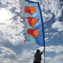 Festival flag waving in open outdoor space