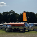 Festival flag design shown at campsite