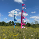 Festival-style flag decorating an outdoor gathering