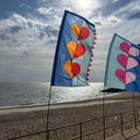 Festival flags in bold colours with satin sheen