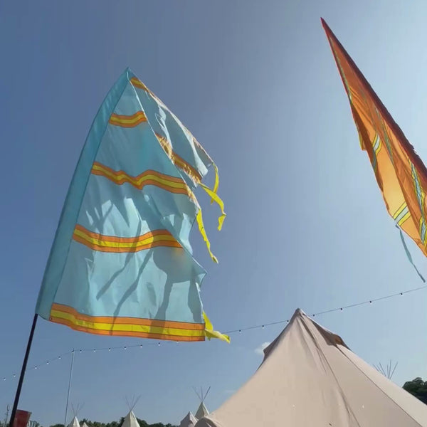 Long festival flag designed to add height and movement